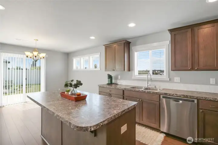 Spacious kitchen featuring a large center island.