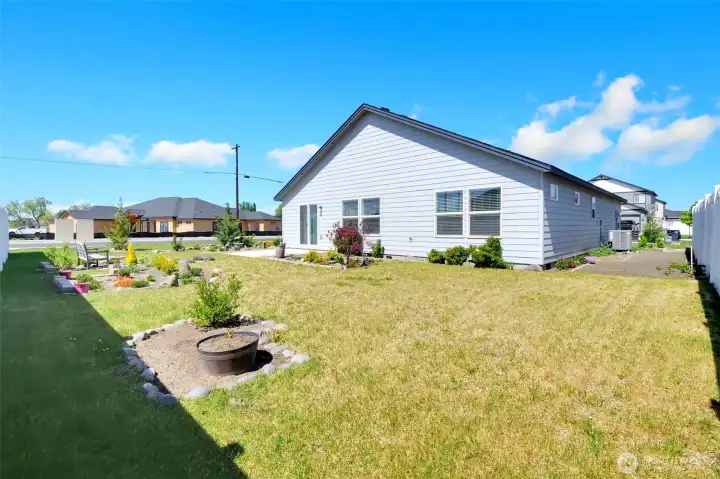 Rear shot of the back yard highlighting the generous outdoor space.