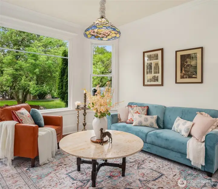 Library with views out onto the sweet, private acreage.