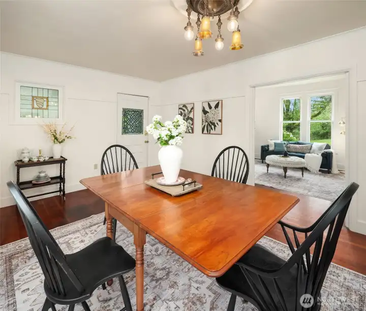 Dining room has its own access to the eastern porch. Living room sits adjacent.