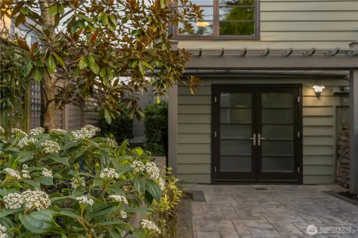 Outside garage has its own parking area.