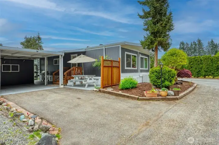 Welcome Home!  Private patio next to front steps into entry.