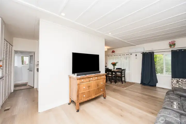 From the entry and living room, go straight into the kitchen and door that opens into sun room.