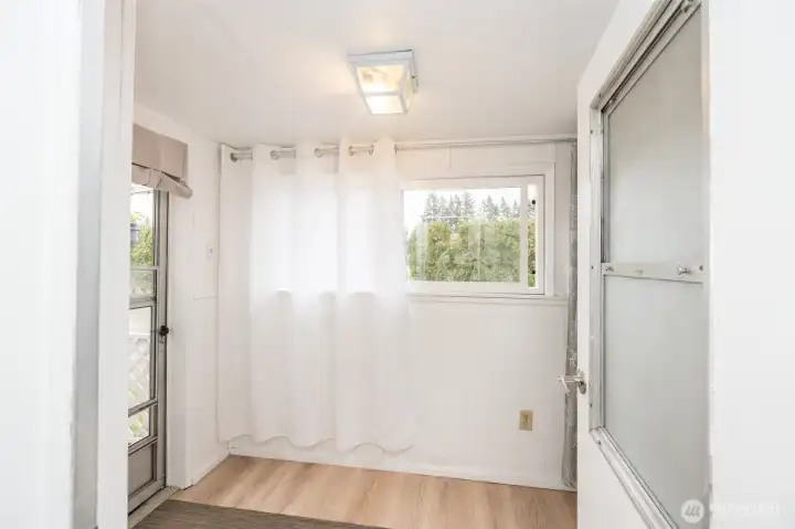 Sun room leads to covered deck