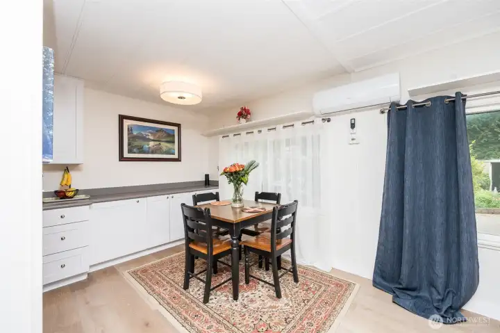 Nice dining area with large windows for lots of natural light and bring the outdoors in.