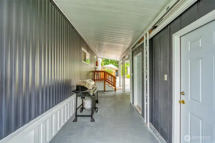 Covered walkway to 2 storage areas