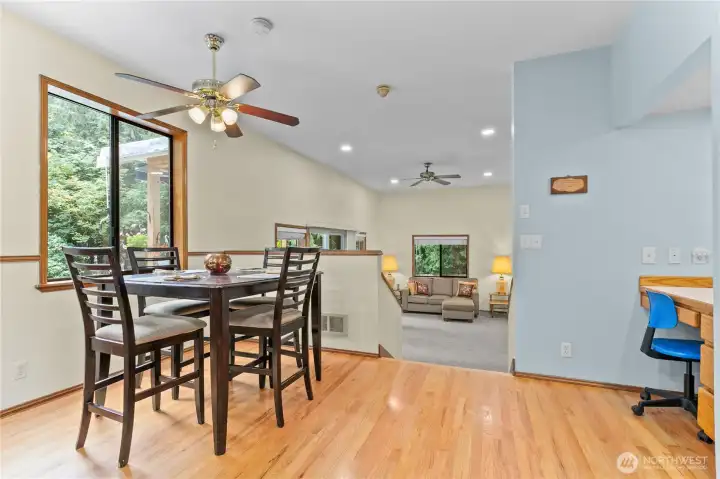 Kitchen's casual dining area opens to massive family room, a great entertaining area