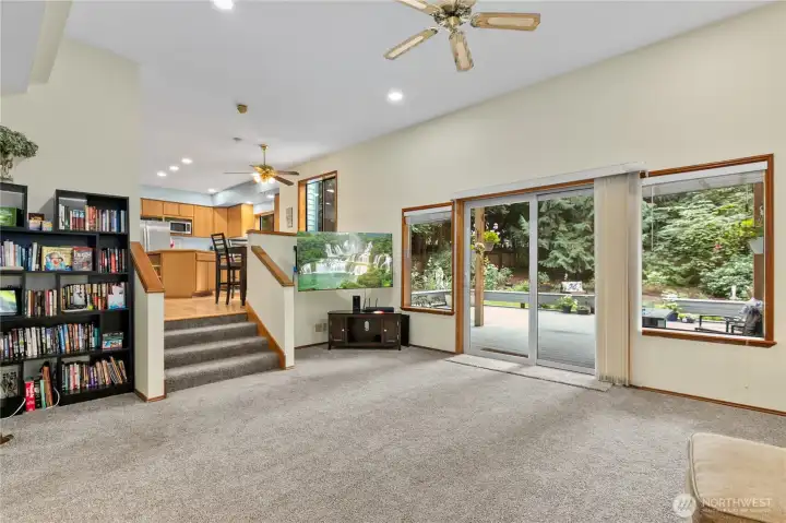 High ceilings and lots of windows make the room feel airy