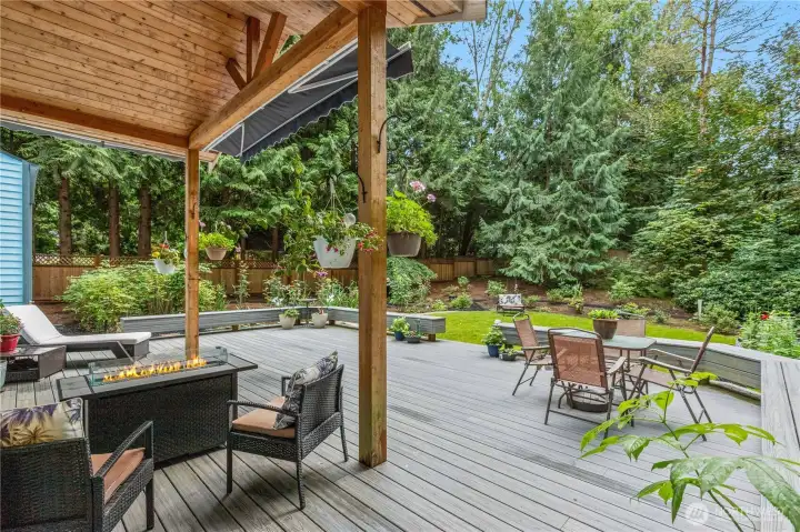 Massive deck offers covered and uncovered areas