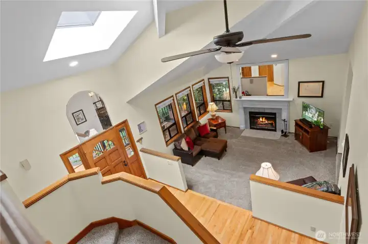 A view from the top of the stairs to the living room