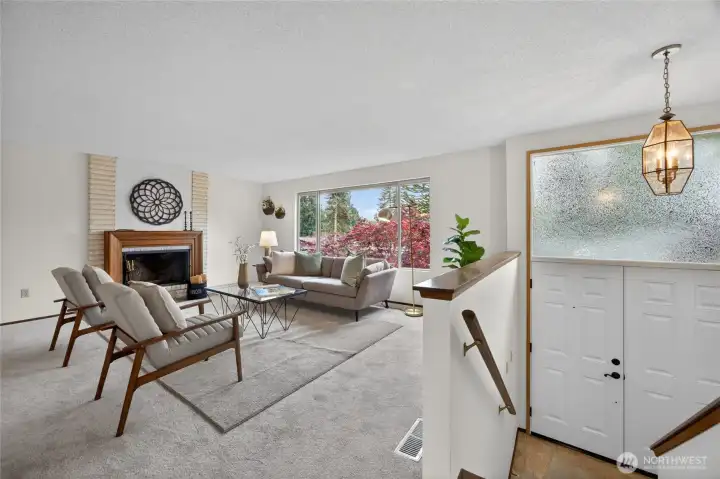 Cozy up to the wood burning fireplace in the main living room.