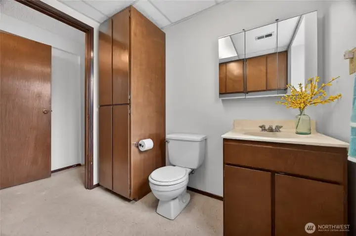Downstairs powder room convenient when you walk in from the garage.  Laundry on opposite side.