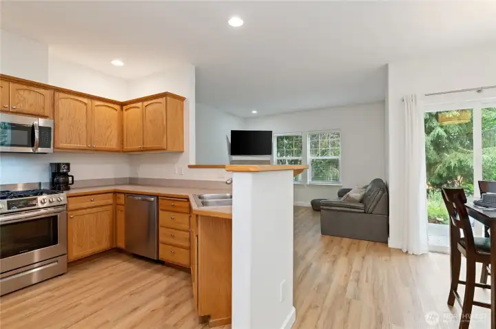 Easy Care Laminate Floors Extend Through the Main Level! Great Natural Light!