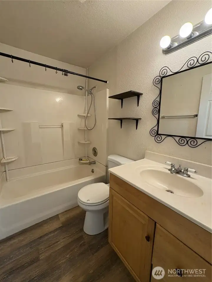 Full bathroom in hall Full bathroom in hall