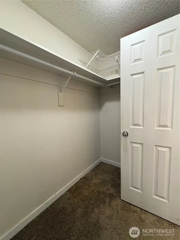 Primary bedroom closet Primary bedroom closet