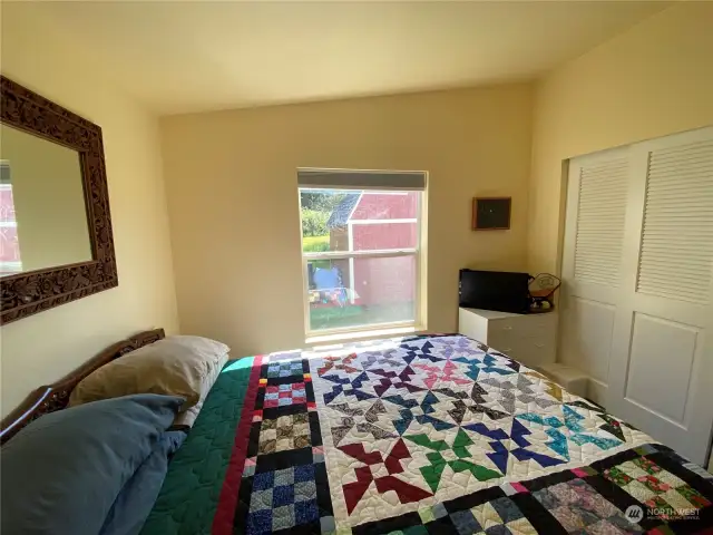 Guest bedroom enjoys plenty of privacy and light.