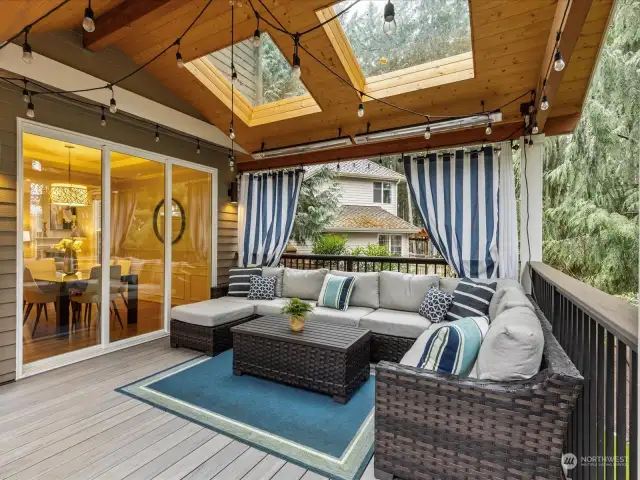 Amazing outdoor covered living space with infra-red heaters! This is an excellent upgrade!