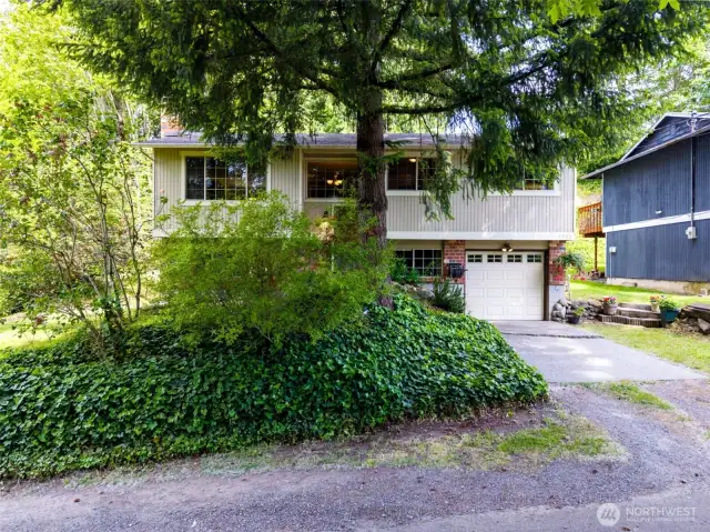 Enjoy charming curb appeal, mature landscaping and quiet location on a deadend street.