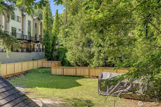 View of development next door and yard