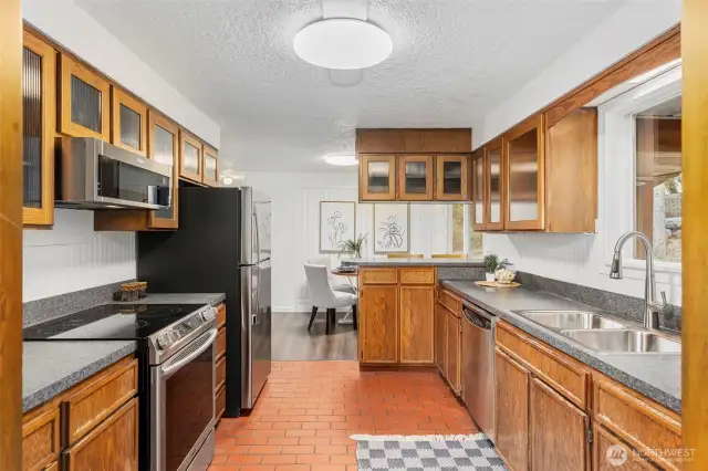 Vintage cabinetry and new frig & microwave
