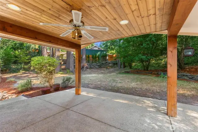 Lovely cedar covered porch for intimate gatherings or entertaining a crowd