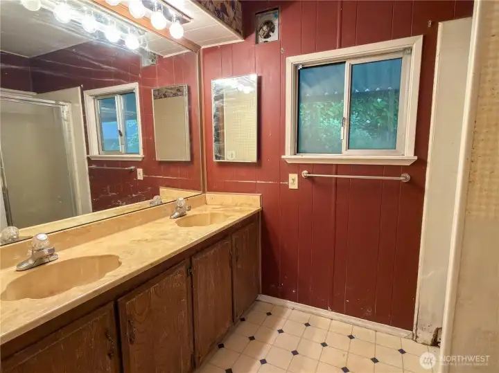 3/4 Bathroom with double sinks.