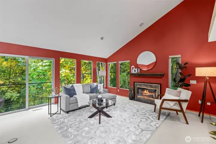 A wall of windows framing the natural landscape.