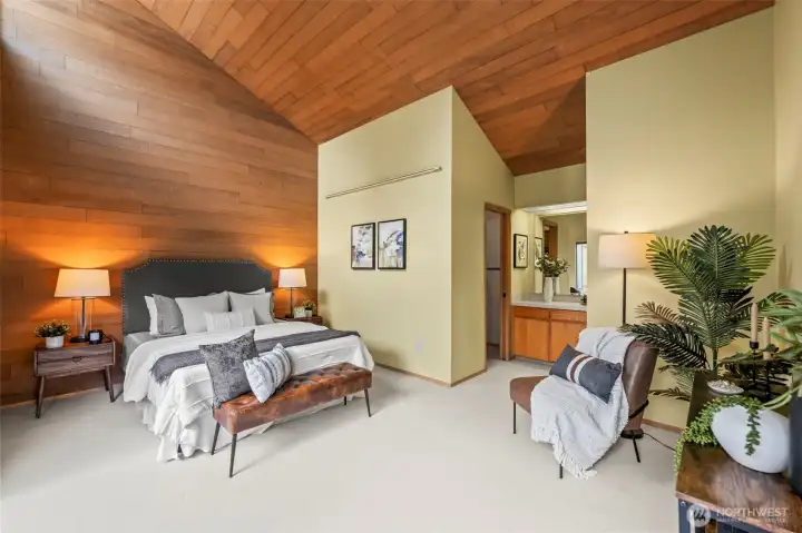 A truly unique primary suite with soaring ceilings!