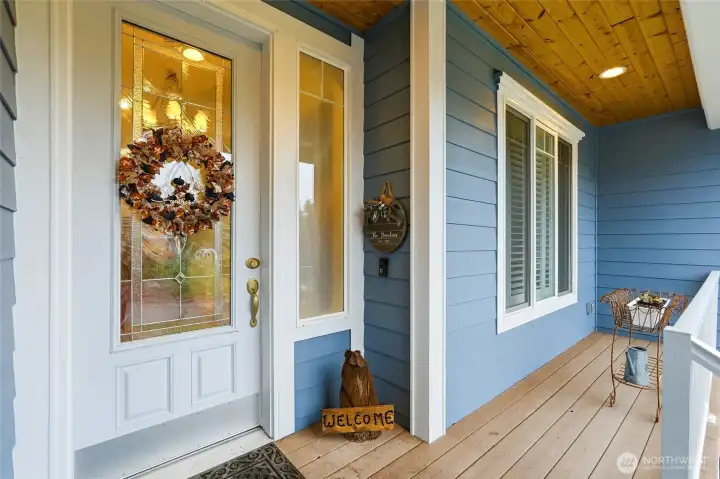 Huge covered front porch—perfect for morning coffee, relaxing, and year-round enjoyment.
