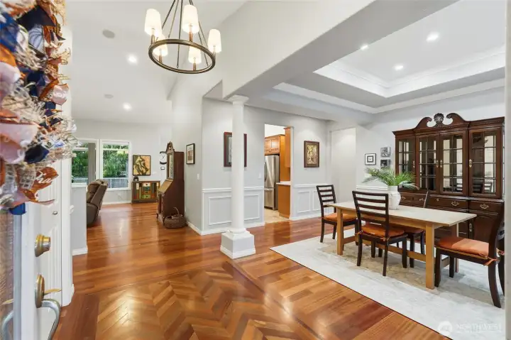 Welcoming foyer with soaring ceilings and abundant natural light.