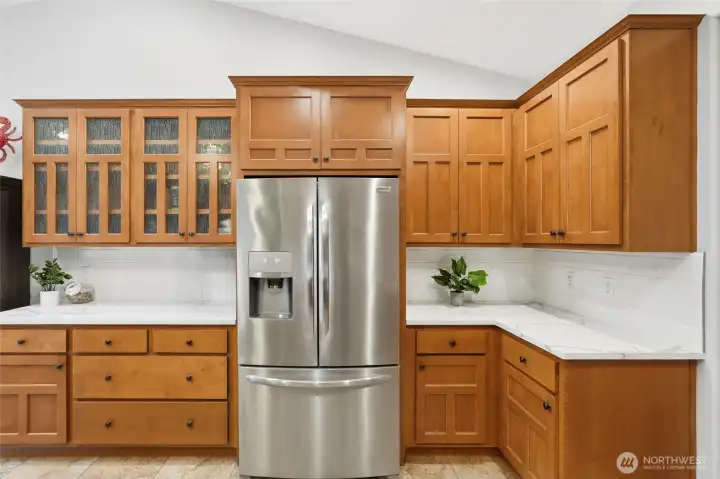 Generous cabinetry and expansive countertops ideal for cooking and entertaining.