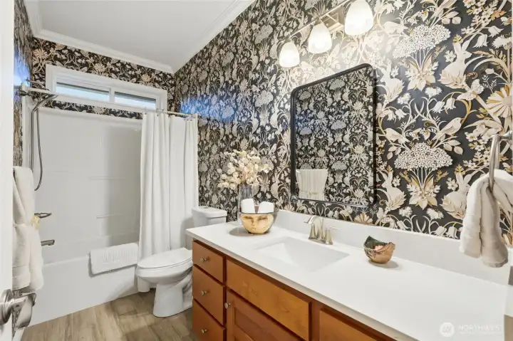 Main bath remodeled with heated floors for year-round comfort.