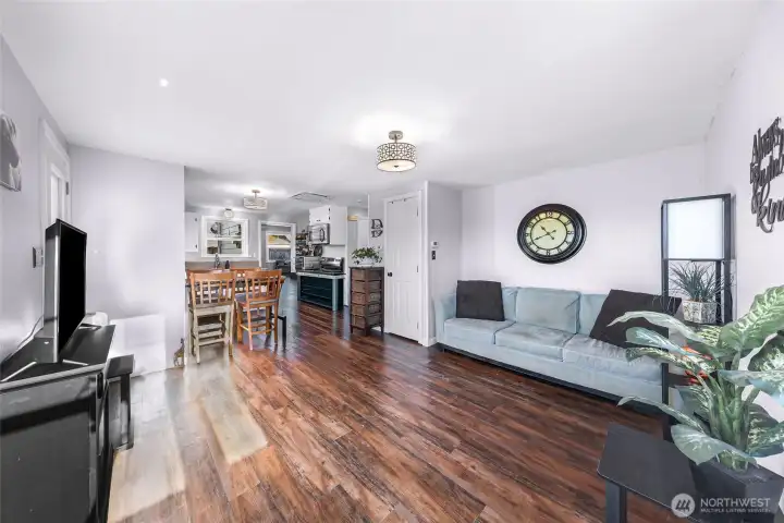 Living room into the kitchen.