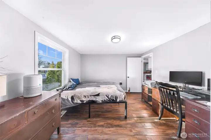 Another view of primary bedroom.