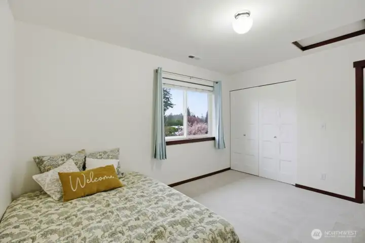 Spacious 3rd bedroom. Note: another full bath upstairs serves these 2 bedrooms.