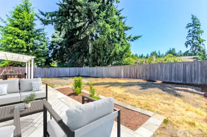 Virtually Staged- Massive fully fenced backyard with oversized patio. Virtually Staged- Massive fully fenced backyard with oversized patio.