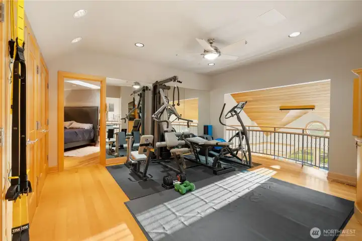 Spacious home gym with natural light