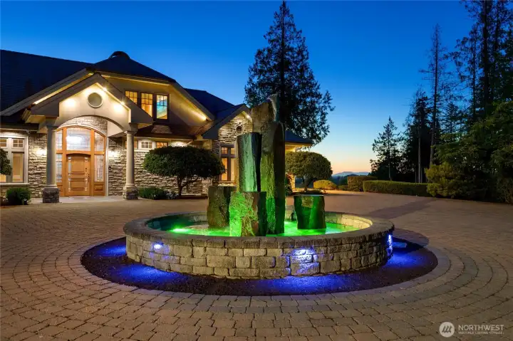 Elegant water fountain welcomes guests as they arrive, multi color lighting, Seahawks Today