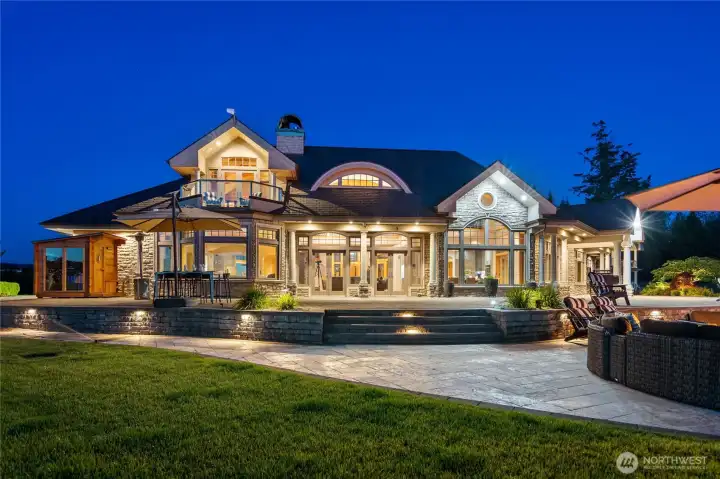 A grand estate with soaring architecture, sweeping terraces, and breathtaking panoramic views