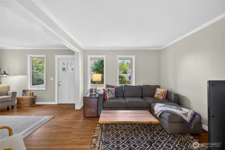 Spacious living room with various gathering areas