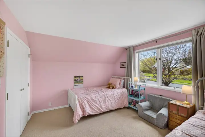 Upstairs second bedroom with lots of natural light