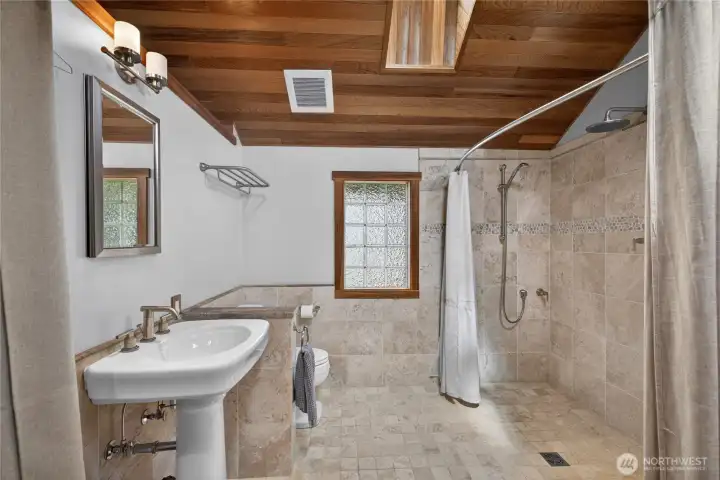 Guest house 3/4 bathroom with heated flooring.