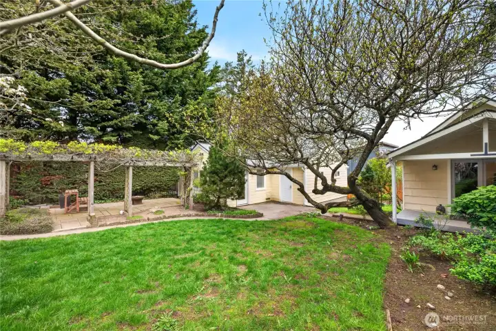 View of garage and shop from backyard