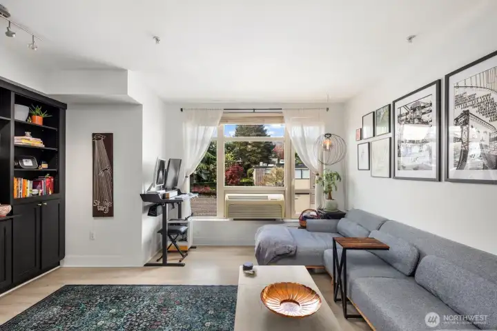 Open Concept Living Space w/ West Facing Windows and AC