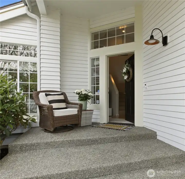 A preview of what's to come! Covered porch, transom windows, indoor-outdoor lifestyle!