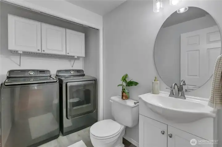 Main level guest bath and laundry.  Easy access! It's a part of the circular floor plan!