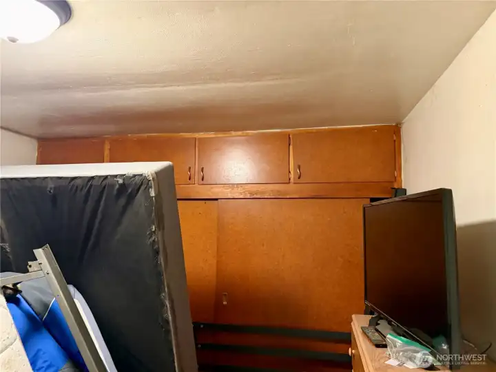This room is full but features built in closet space.