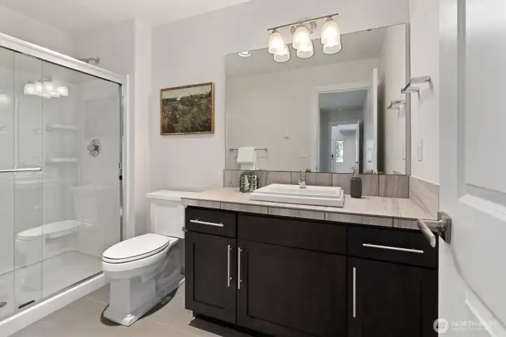 Ensuite bath for the ground level bedroom.