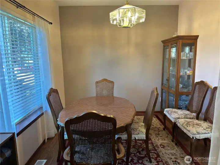 Dining room fits table and chairs as well as a china hutch. Dining room fits table and chairs as well as a china hutch.