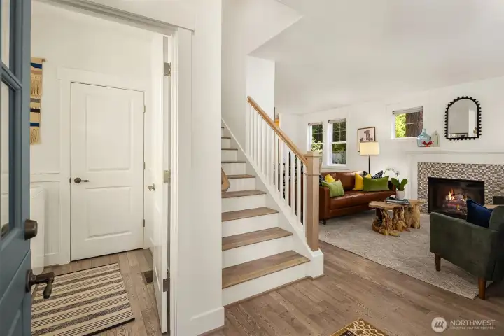 The home is immediately inviting with its fresh interior paint, engineered hardwood flooring, and open floor plan.